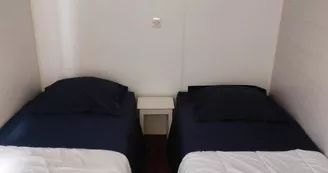 Chambre 2 lits 1 personne